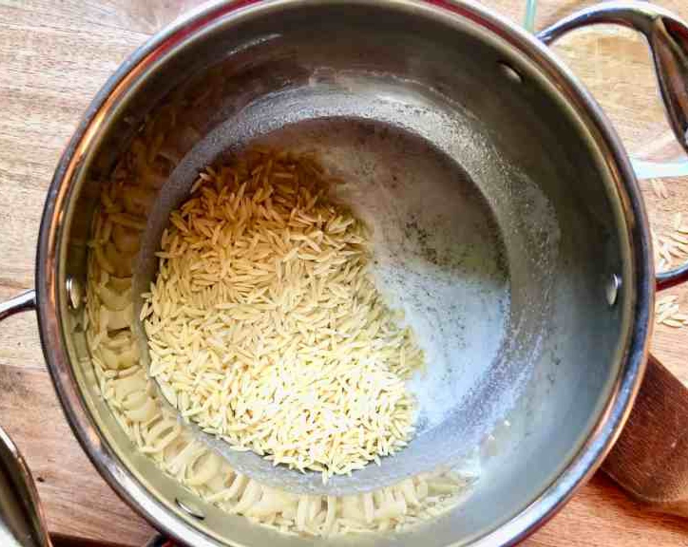 step 1 Heat a medium pot over medium-high heat, add Butter (1/4 cup). When the butter is melted, add the Orzo Pasta (3/4 cup) and cook for about 2 minutes or until lightly toasted and golden, stirring often. Keep a close watch so the orzo doesn't burn.