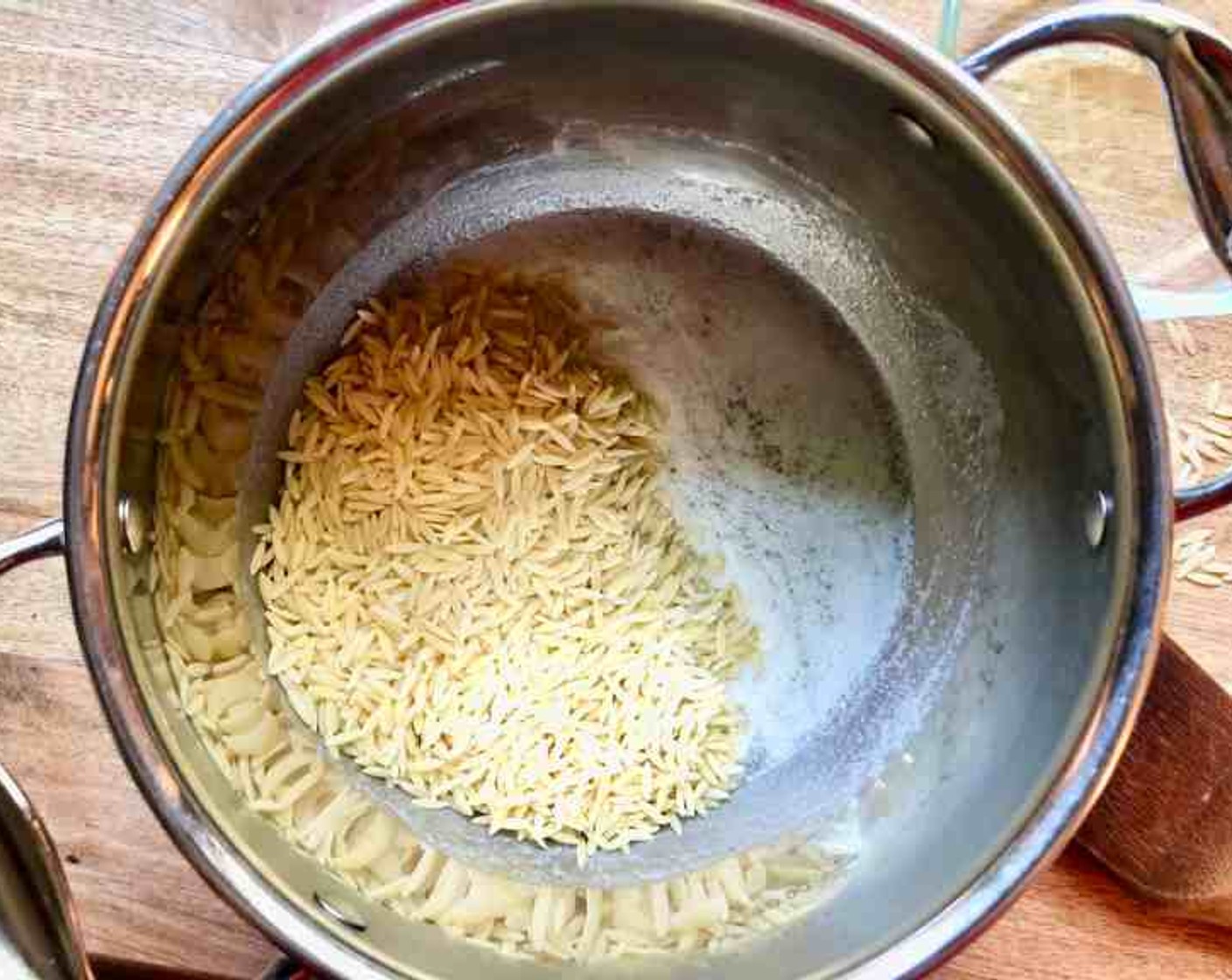 step 1 Heat a medium pot over medium-high heat, add Butter (4 Tbsp). When the butter is melted, add the Orzo Pasta (3/4 cup) and cook for about 2 minutes or until lightly toasted and golden, stirring often. Keep a close watch so the orzo doesn't burn.