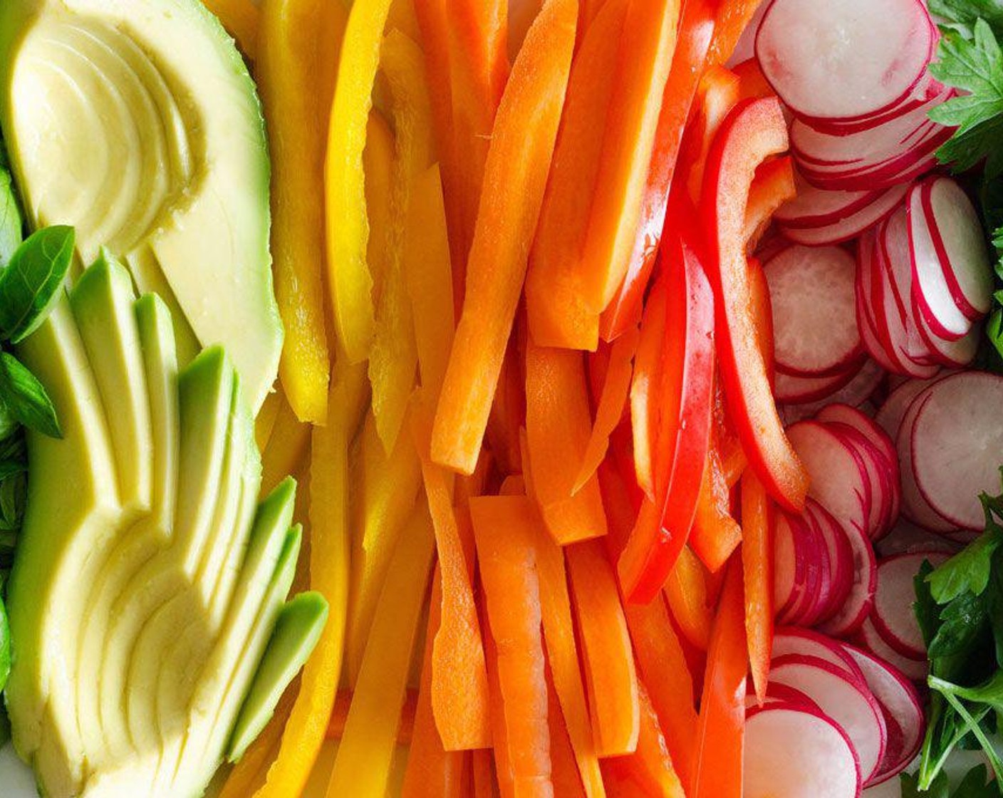 step 2 Prepare: Thinly slice Radish (1 bunch), Red Bell Pepper (1/2), Yellow Bell Pepper (1/2), Carrot (1 cup), Avocado (1), Fresh Basil Leaf (1/2 cup), Fresh Cilantro (1/2 cup) and arrange near your workspace.