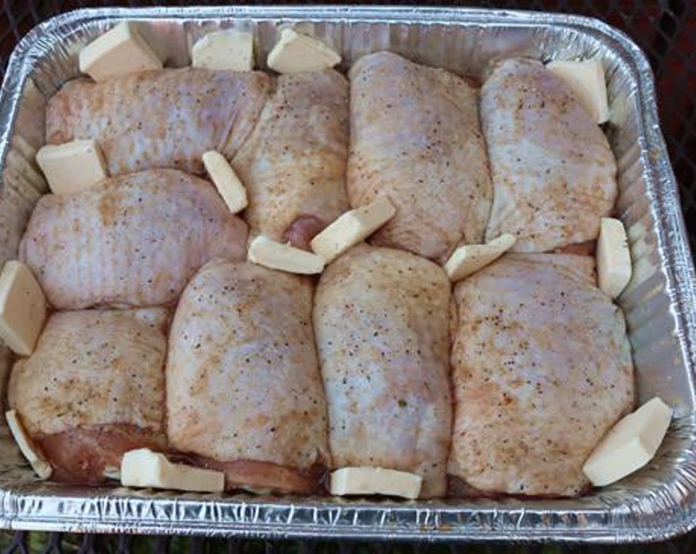 step 4 Cut Unsalted Butter (1/2 cup) into pats and place around the edges and between the thighs.