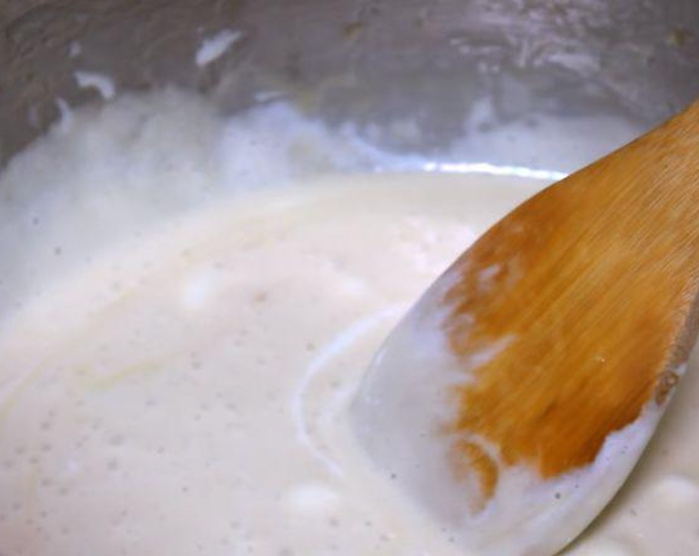 step 1 In a pan over low heat, melt the Butter (4 Tbsp). Add the Mini Marshmallows (1 1/2 pckg) to the melted butter.