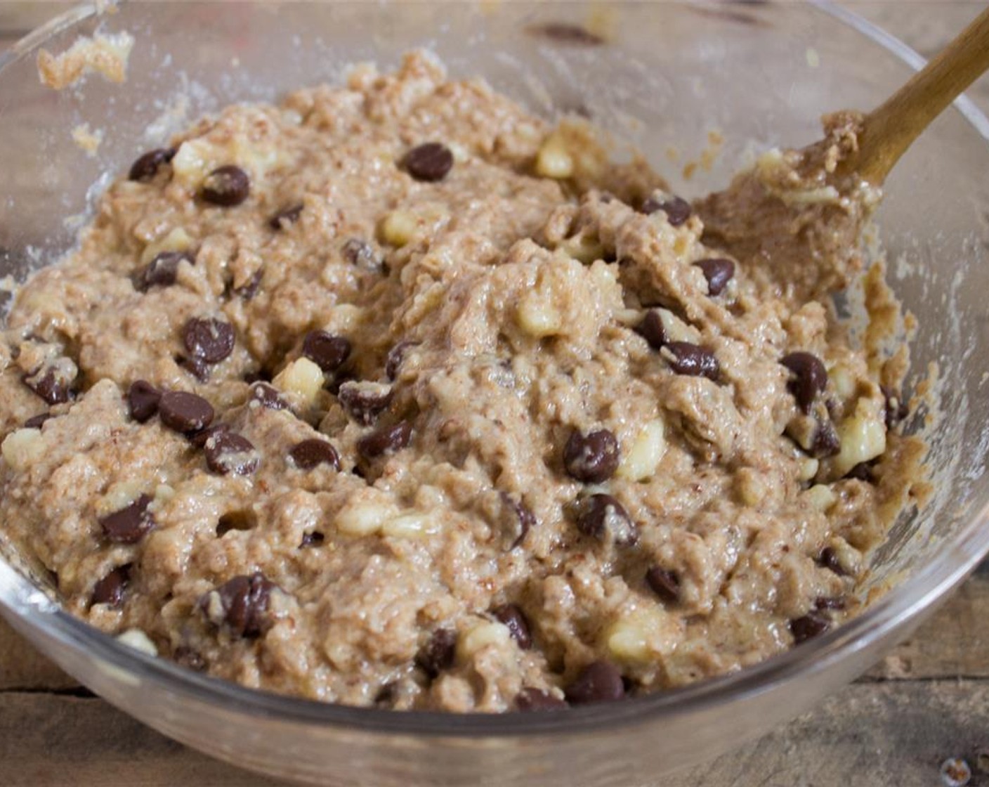 step 5 Pour the wet ingredients into the dry ingredients until they are combined. It will be thick. Then, stir in Cacao Baking Chips (1 cup).