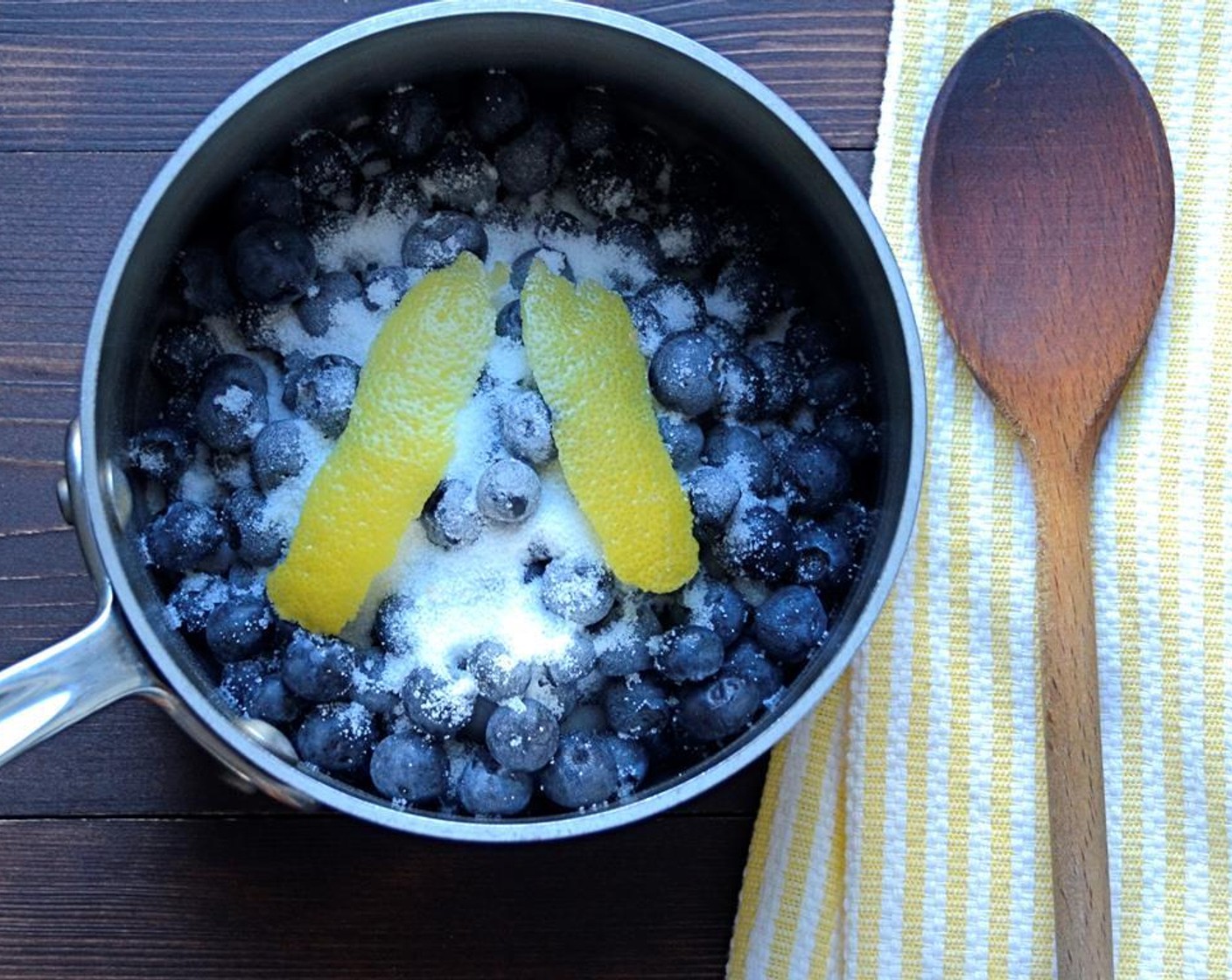 step 1 Add the Fresh Blueberries (2 cups), Granulated Sugar (1/3 cup), lemon rind, and Lemon (1) to a small saucepan and heat to a boil.