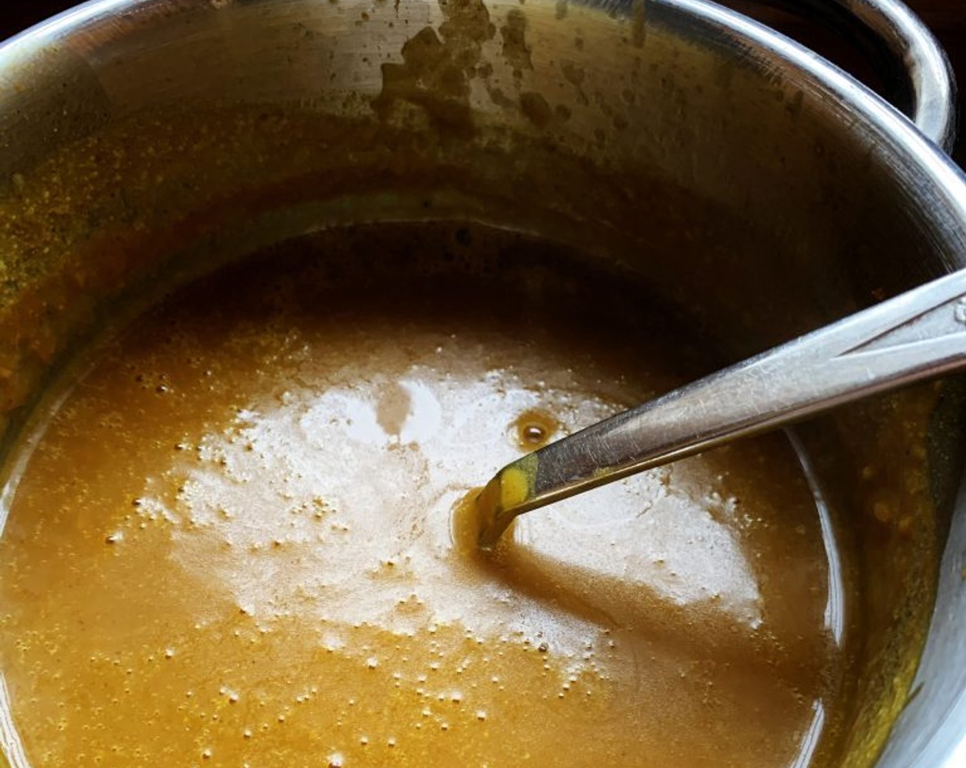 step 2 In a saucepan combine the Full-Fat Coconut Milk (1/2 can), Water (1/2 cup), Pumpkin Purée (1/2 cup), Curry Paste (1 1/2 Tbsp), Soy Sauce (1 1/2 Tbsp), and Fresh Ginger (1/2 Tbsp). Bring to a simmer and let it cook for 10 minutes.