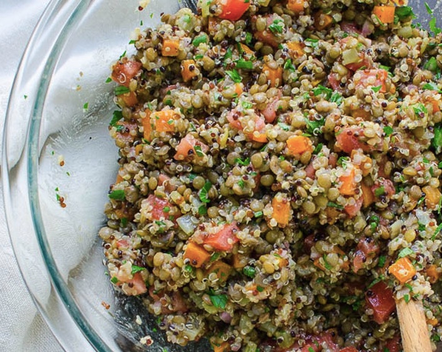step 7 In a large bowl, combine lentils, quinoa, diced plum tomato, and parsley, and toss to combine. Add 3 tablespoons of shallots vinaigrette and toss. Taste, and add more vinaigrette as needed. Serve warm, or at room temperature.