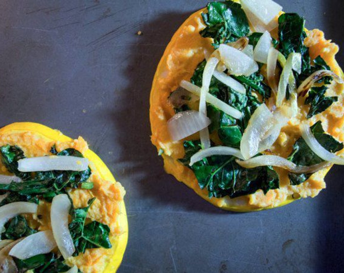 step 8 Smooth sweet potato mash over each patty pan slice and top with cooked onions and kale.