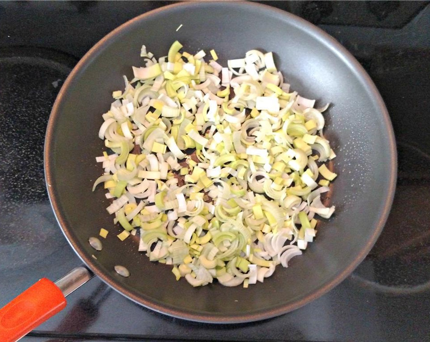 step 3 Warm Olive Oil (1 Tbsp) in a oven-safe saucepan and, once warm, saute leeks in oil for 2 to 3 minutes over medium heat until they get some color.
