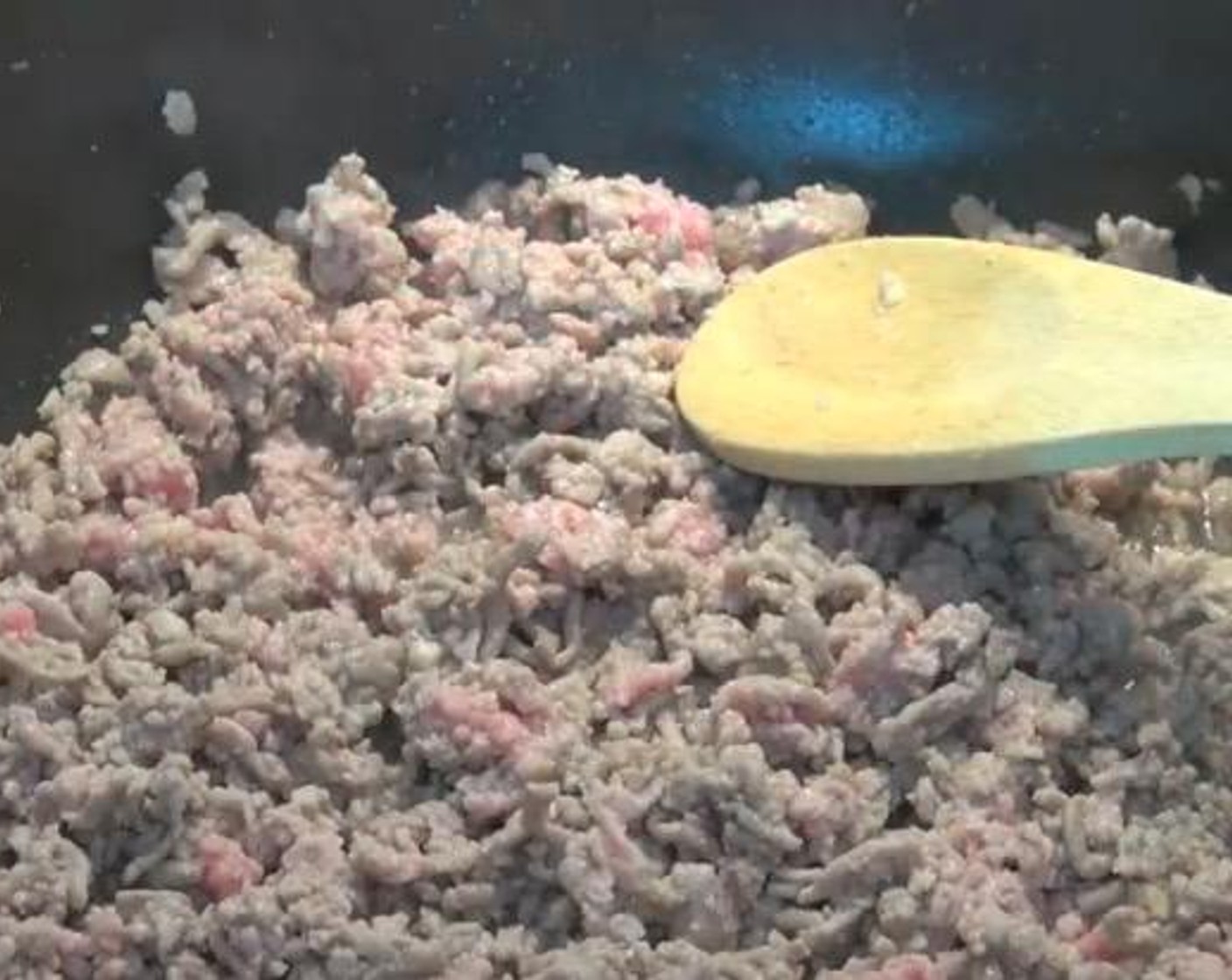 step 1 In a fry pan, add Vegetable Oil (1 Tbsp), Garlic (2 cloves), Fresh Ginger (1/2 Tbsp) and Ground Pork (1.1 lb). Fry until meat is browned.