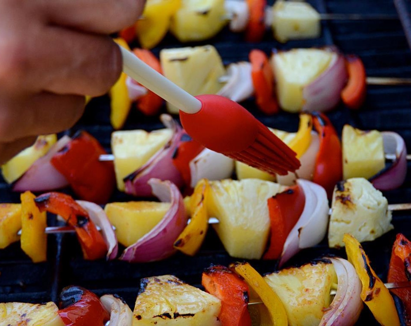 step 9 Heat the grill to medium-high heat, about 450 degrees F (230 degrees C). Place the vegetable skewers on the grill and brush with marinade. Flip the skewers after 3-4 minutes and brush on more marinade. Cook the vegetables until crisp-tender and slightly charred.