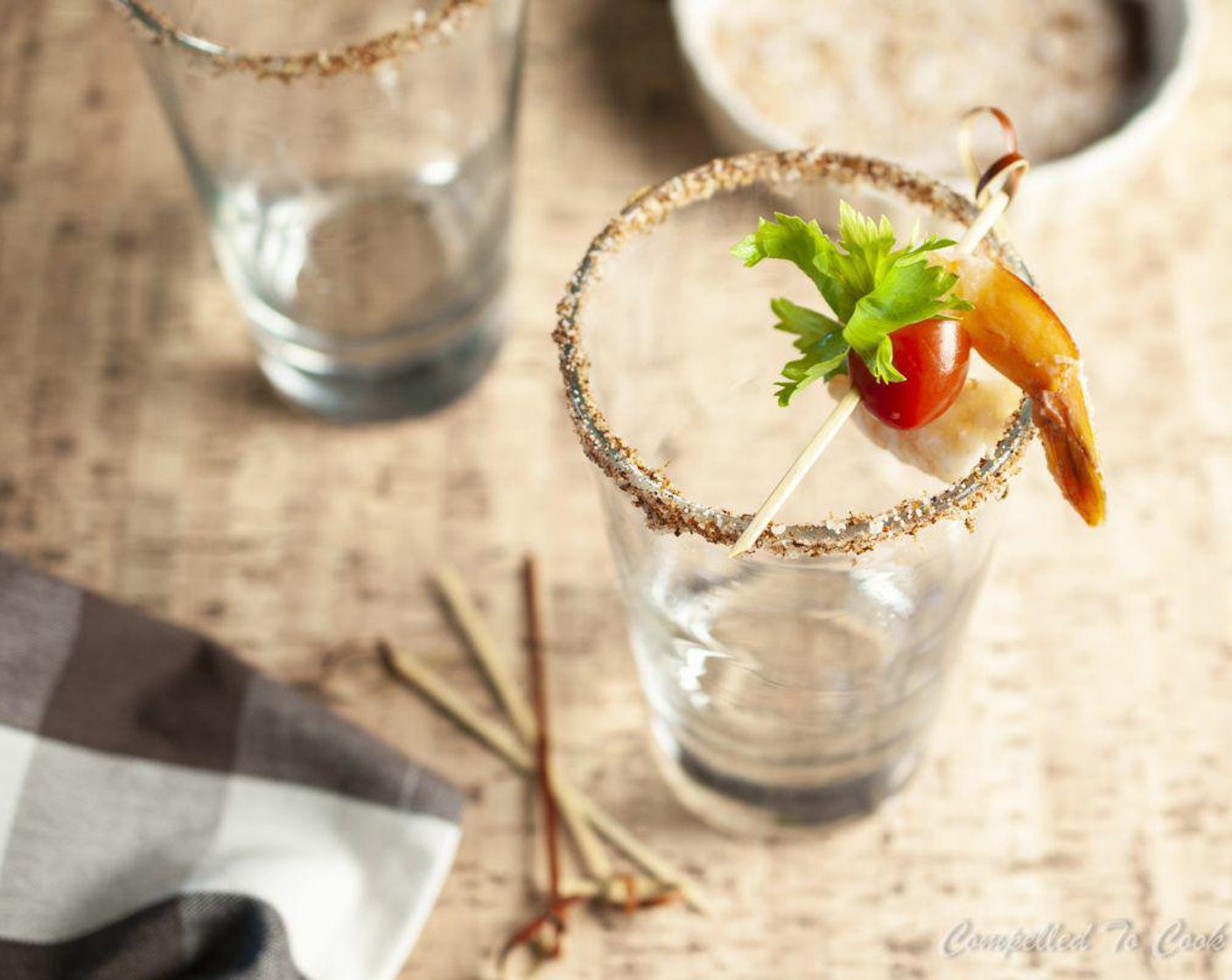 step 1 In a flat shallow dish, combine Salt (1 Tbsp), Chili Powder (1/2 tsp), and zest from the Limes (4). Cut one wedge out of the whole Lime and run along the rim of 4 tall beer glasses to wet the edge. Dip each glass rim into salt to rim the edge. Set aside.