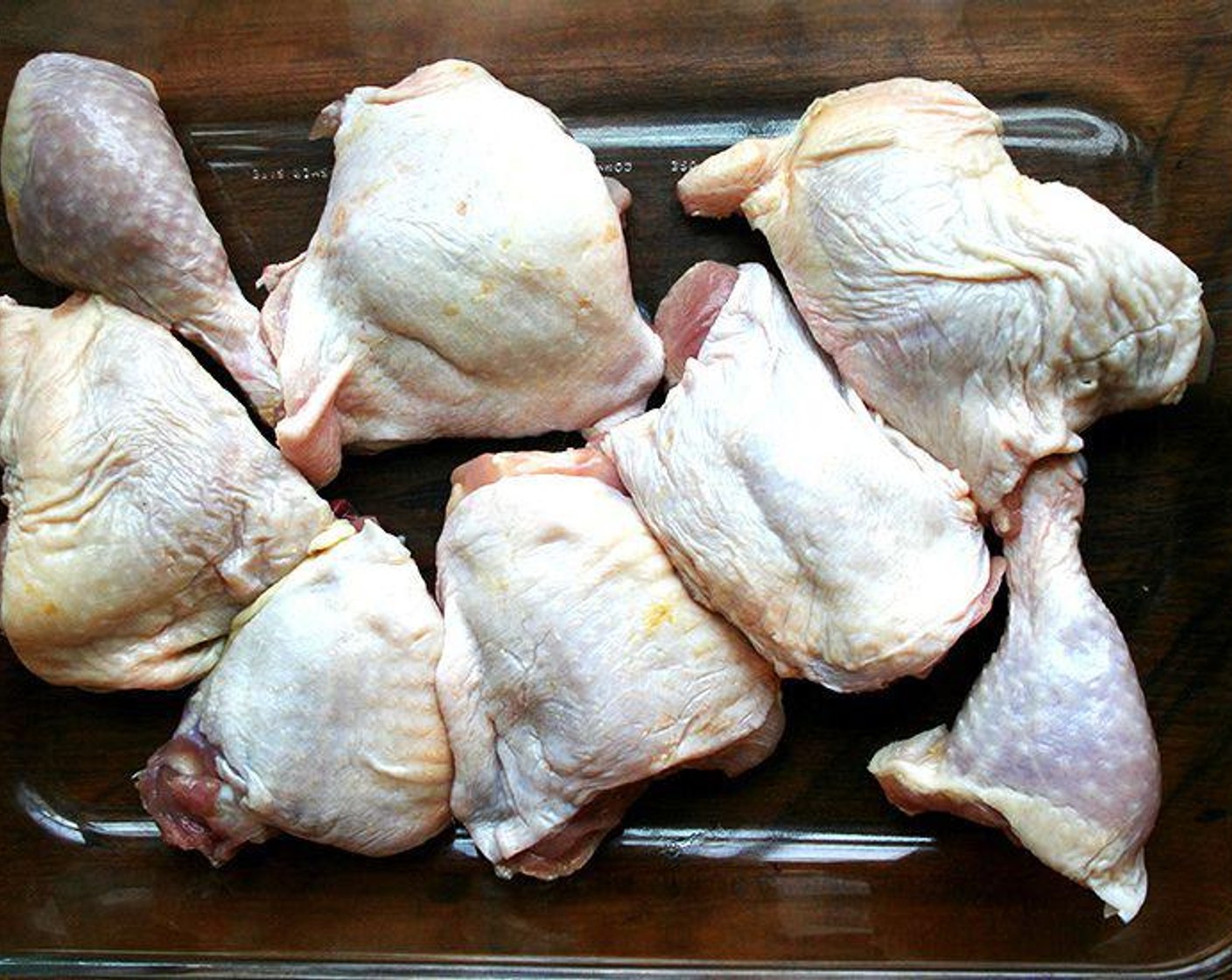 step 2 Place Bone-In, Skin-On Chicken Legs (2 lb) in a greased (I always forget) shallow baking pan skin-side up.