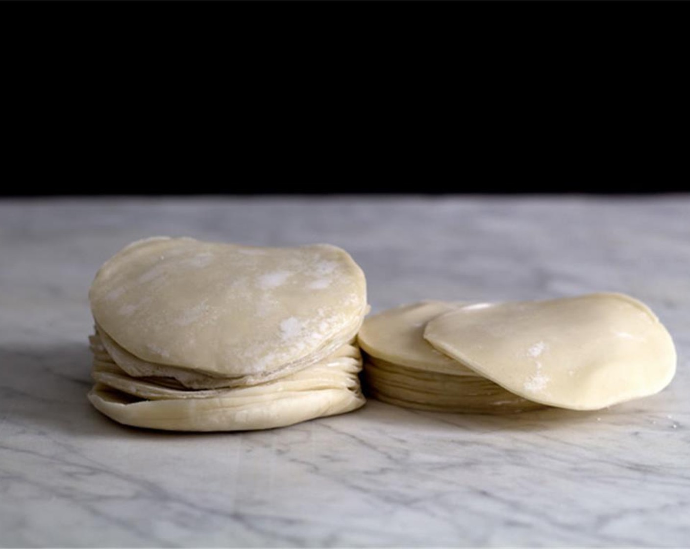 step 1 Lightly dust both sides of the Dumpling Wrappers (20) with All-Purpose Flour (to taste) to prevent sticking.