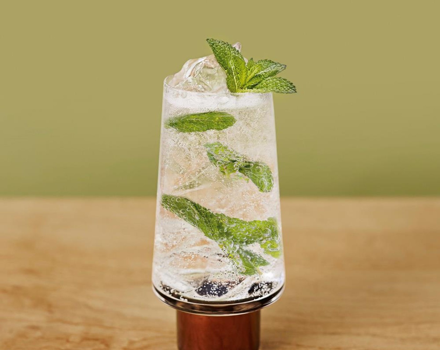 step 3 Top with Club Soda (as needed) and garnish with Fresh Mint Leaves (7).