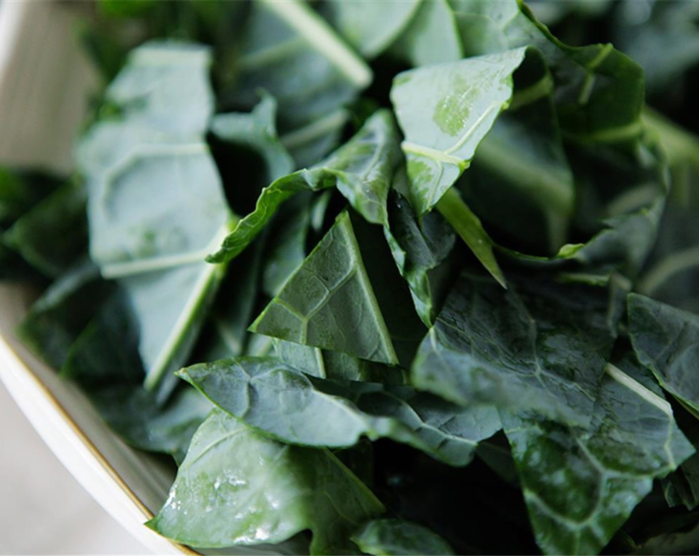 step 5 Wash Collard Greens (1 bunch) in water, handling gently so as not to bruise them. Remove stems from collard greens, tear into 2-inch pieces, and set aside.