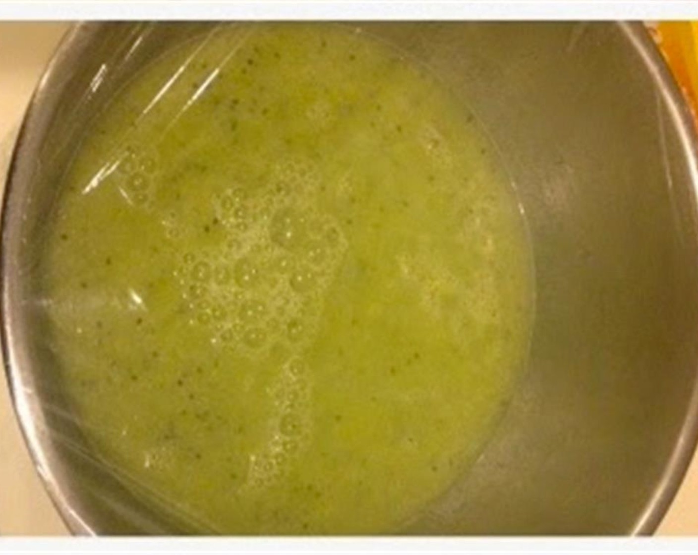 step 3 Combine the kiwi juice with the water. Transfer into shallow container and freeze it for 2-3 hours or overnight.