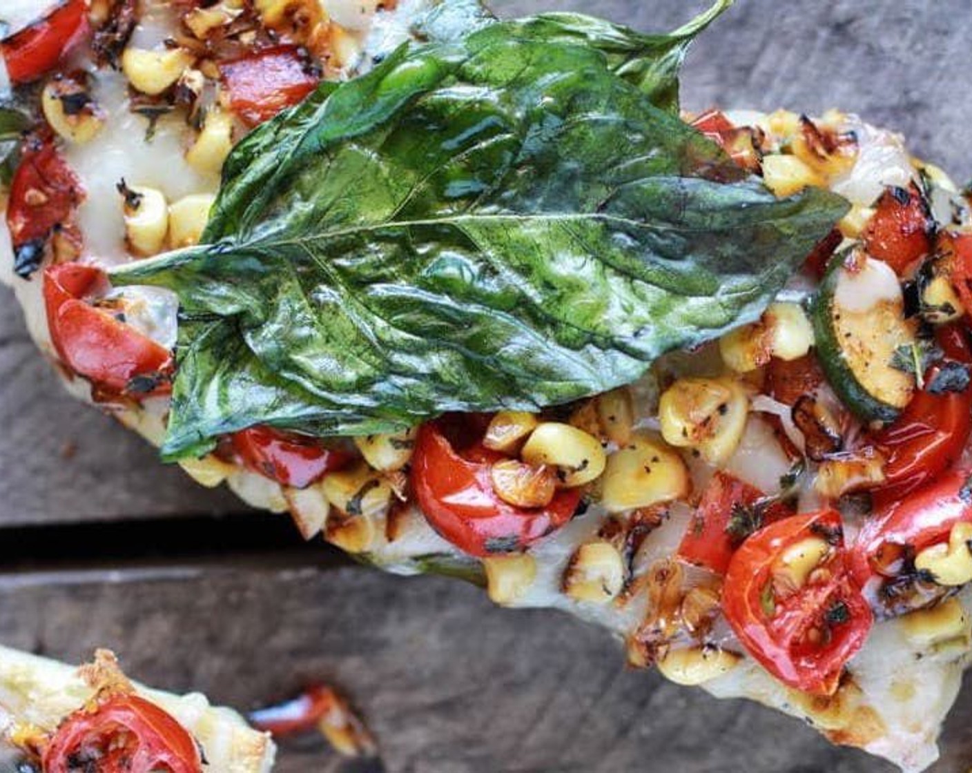 step 10 Sprinkle on equal amounts of the Fontina Cheese (2 cups) and then top each half with equal amounts of the caramelized garden vegetables. Finish with a sprinkle more of fontina cheese if desired.