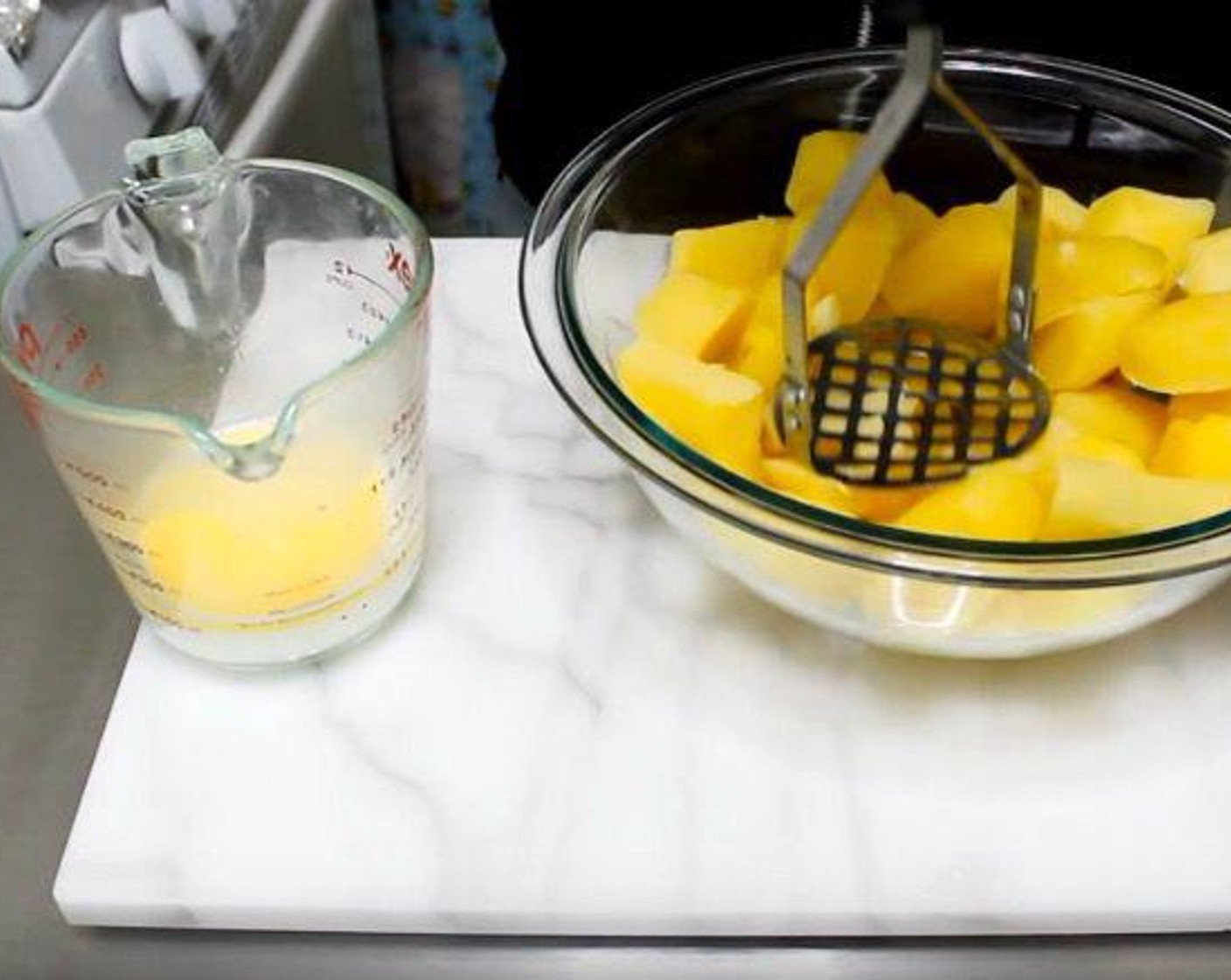 step 1 In a mixing jug, add Butter (4 Tbsp) and Milk (2/3 cup). Heat in the microwave until melted.