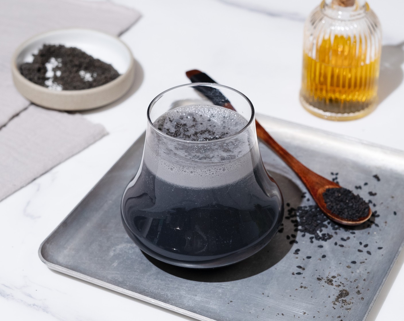 step 2 Into a glass, pour the drink. Optionally garnish with Toasted Black Sesame Seeds (1 tsp) and serve.