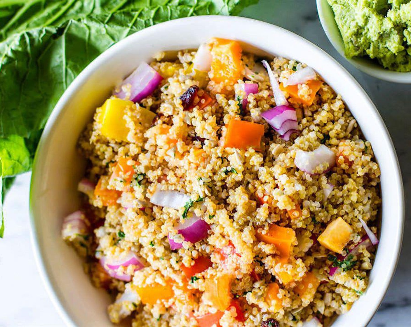step 5 Combine Red Onion (1/2 cup), Roma Tomato (1), Red Bell Pepper (1/2 cup), and Mango (1/2 cup) in a large bowl with the Quinoa (2 cups). Add Dried Cranberries (1/3 cup), Sunflower Seeds (1/3 cup), and Fresh Cilantro (1/4 cup). Toss all together.
