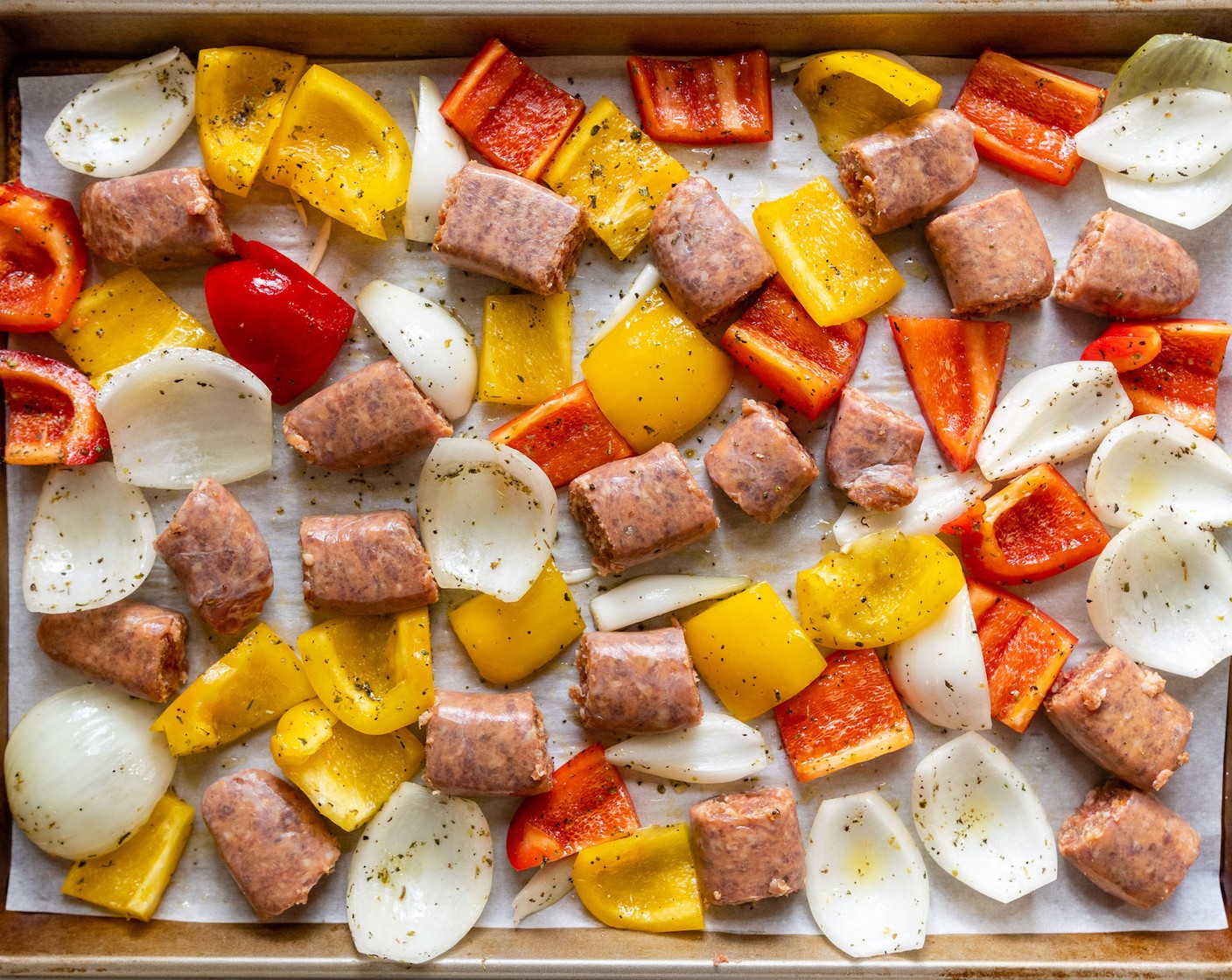 step 3 Spread out evenly on the sheet pan. Nestle the Italian Sausage Link (1 pckg) in between the veggies. Bake in the oven for 15 minutes.