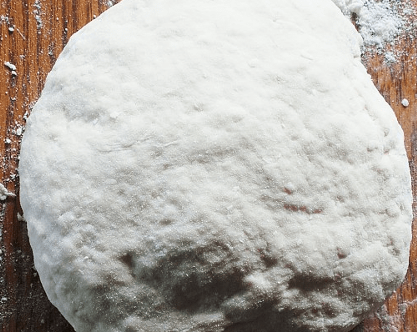 step 3 On a floured countertop, knead the dough for about 10 minutes until it is smooth and elastic. Try working in as much flour as possible to form a firm and stiff dough.