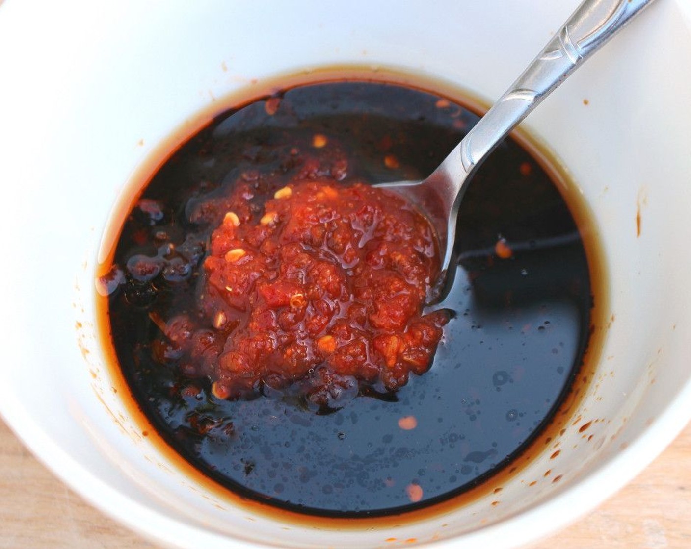 step 3 Into a mixing bowl, add Soy Sauce (1/3 cup), Hoisin Sauce (1/3 cup), Shaoxing Cooking Wine (1/3 cup), Chili Paste (1 Tbsp), Brown Sugar (1 Tbsp), Garlic Paste (1 Tbsp), Corn Starch (1 Tbsp), and Fresh Ginger (1/2 Tbsp). Stir well to combine.