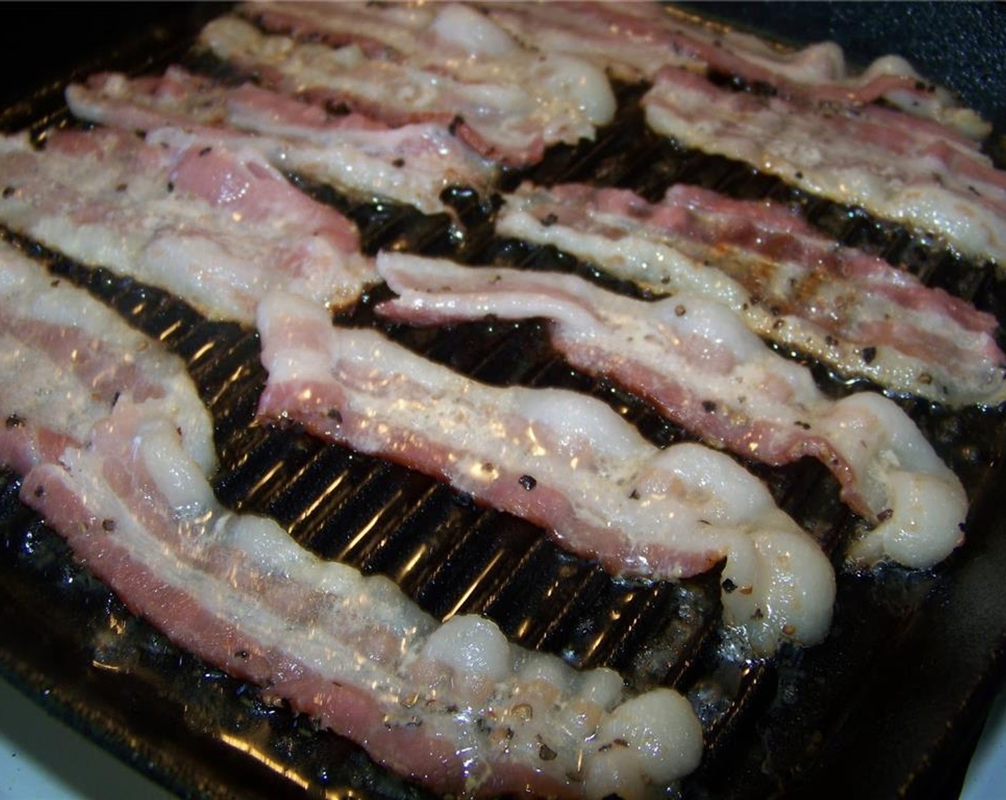 step 4 Fry the Bacon in a pan until crispy. Set aside.