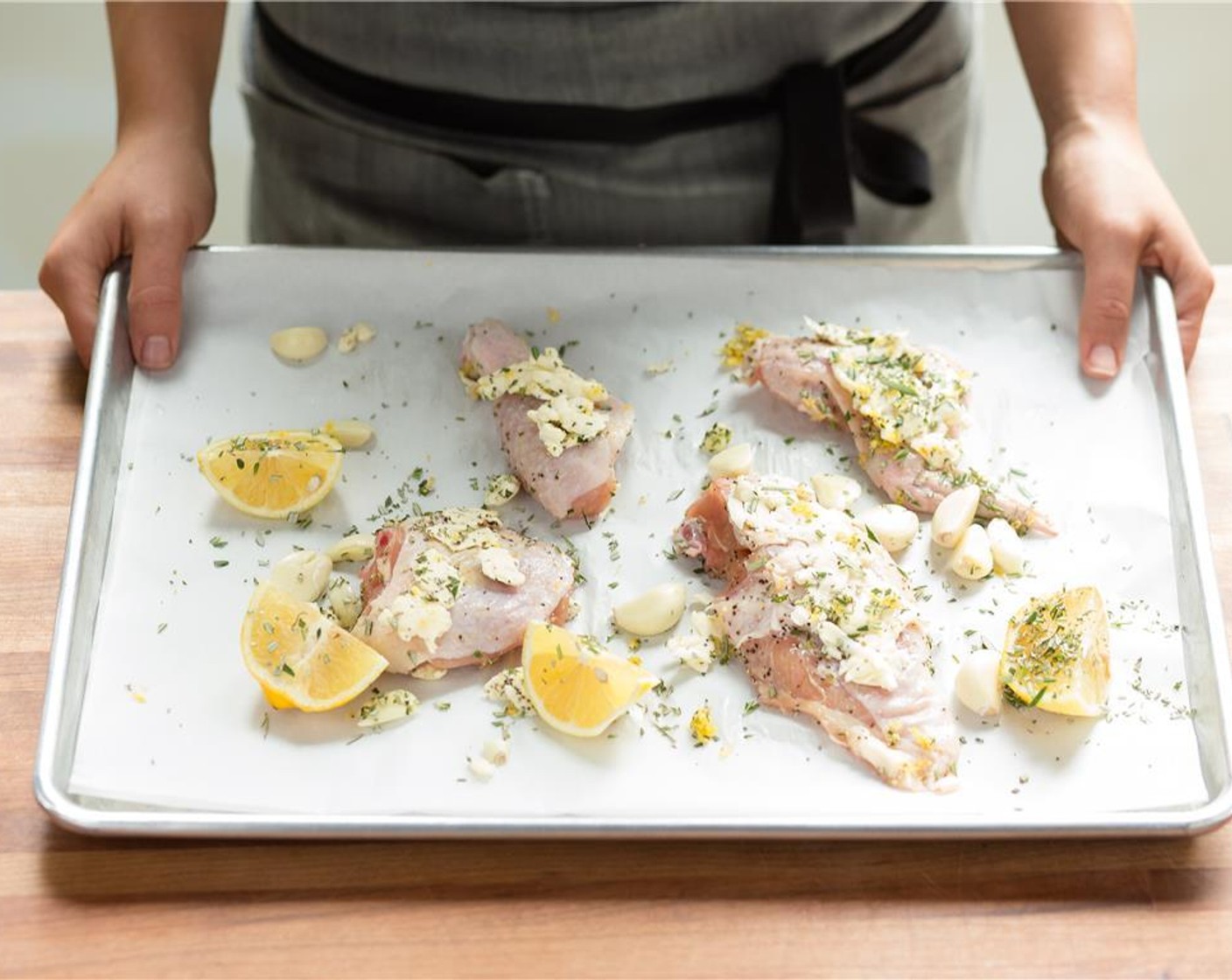 step 8 Place the chicken on a sheet pan lined with parchment paper and place in the oven. Roast for 35 minutes until the chicken is cooked through and the skin is golden brown.