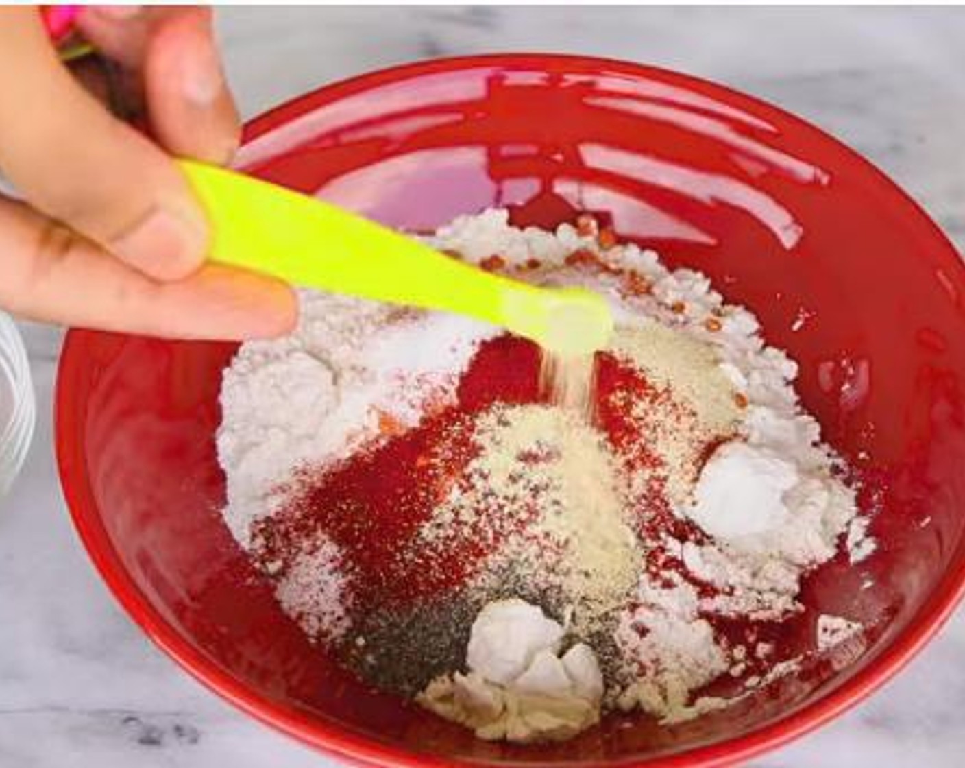 step 3 In a separate bowl, mix together the All-Purpose Flour (1 cup), Cayenne Pepper (1 Tbsp), Salt (1 tsp), Ground Black Pepper (1 tsp), Onion Powder (1 tsp), Paprika (1/2 tsp), and McCormick® Garlic Powder (1/8 tsp).
