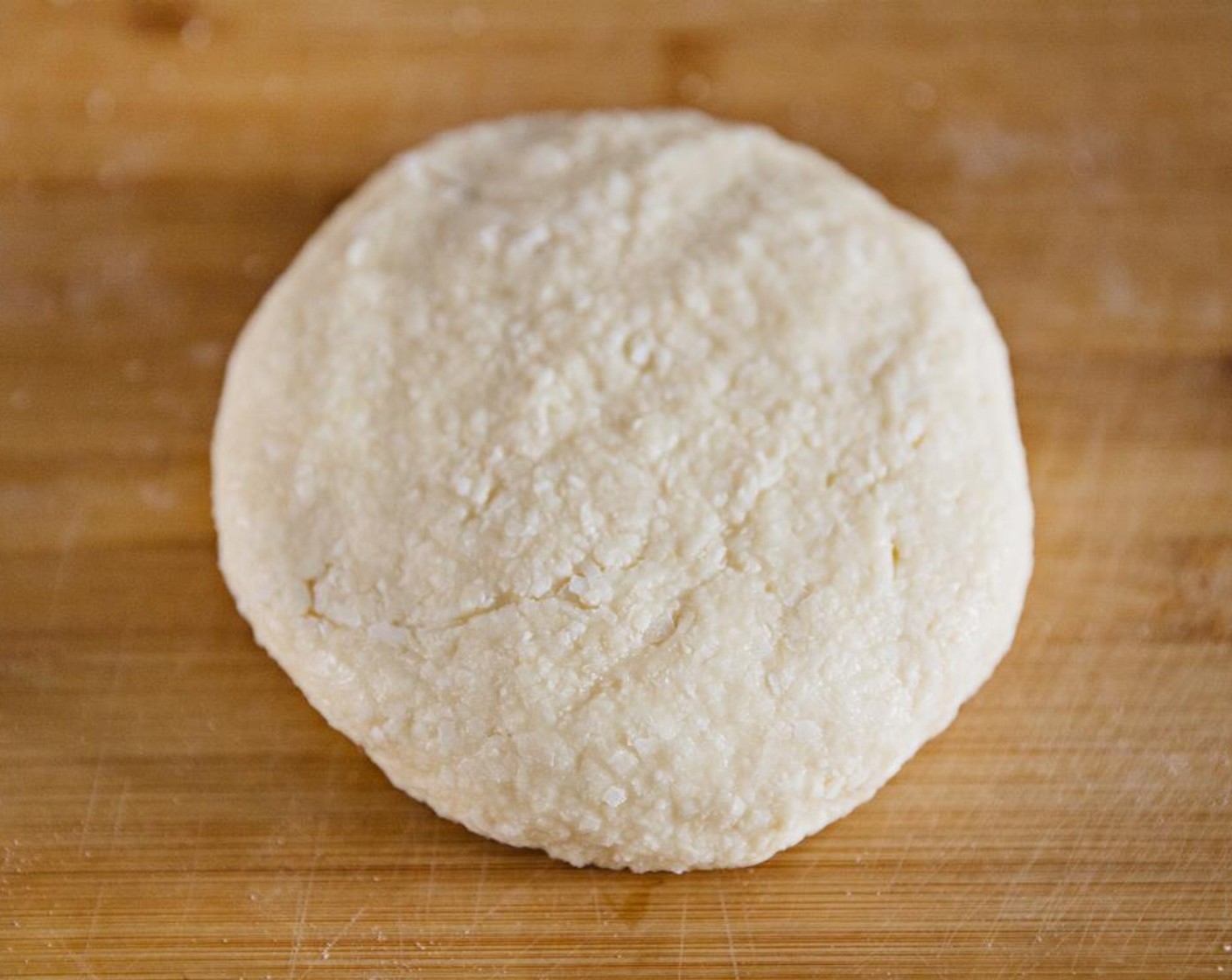 step 8 Turn out on to a powdered sugar-dusted surface and knead until it comes together completely.