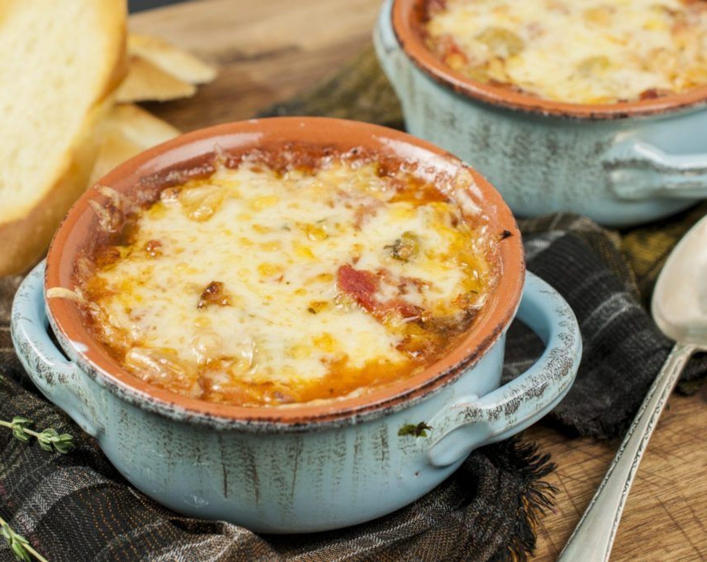 step 10 Top each with 1/4 cup of Gruyère Cheese (1 cup) and broil until cheese has melted and is golden. Serve with crusty bread if desired.