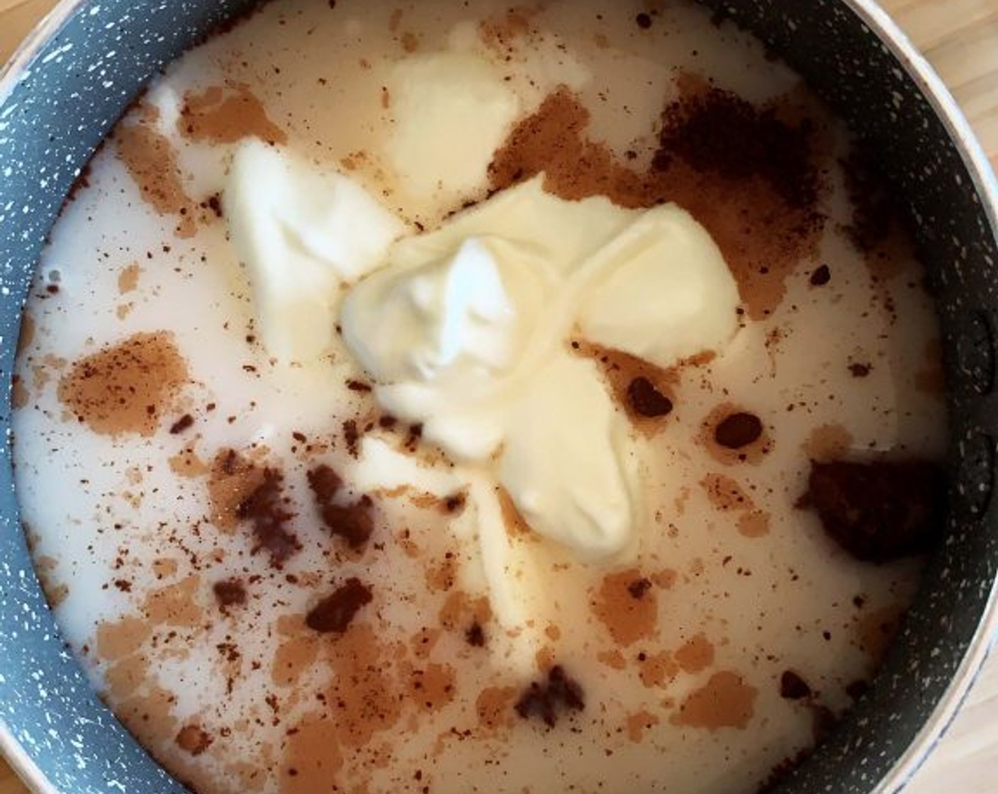 step 1 Place the Unsweetened Almond Milk (5.5 oz), Cacao Powder (2 tsp), Soy Yogurt (4 Tbsp), Agar-Agar Flakes (1 tsp), and Natural Sweetener (1/4 tsp) into a saucepan and bring to a gentle boil.