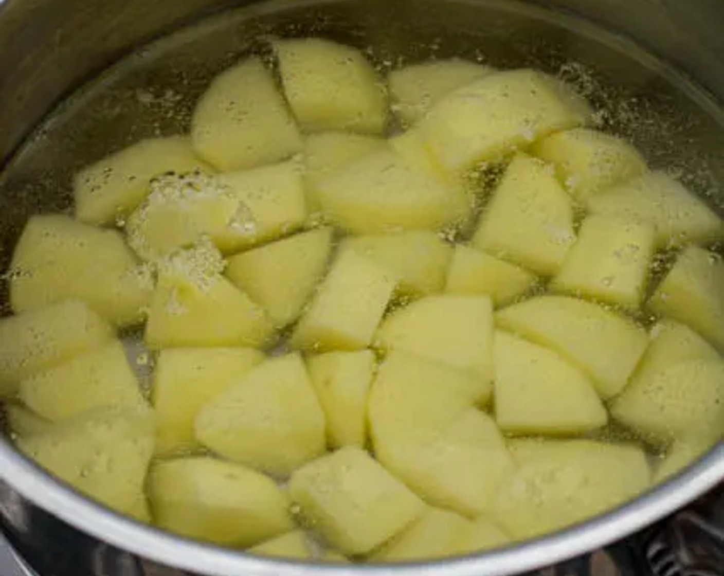 step 1 Boil the Yukon Gold Potatoes (2) in water for 10 minutes or until soft. Drain the water and set the potatoes aside.