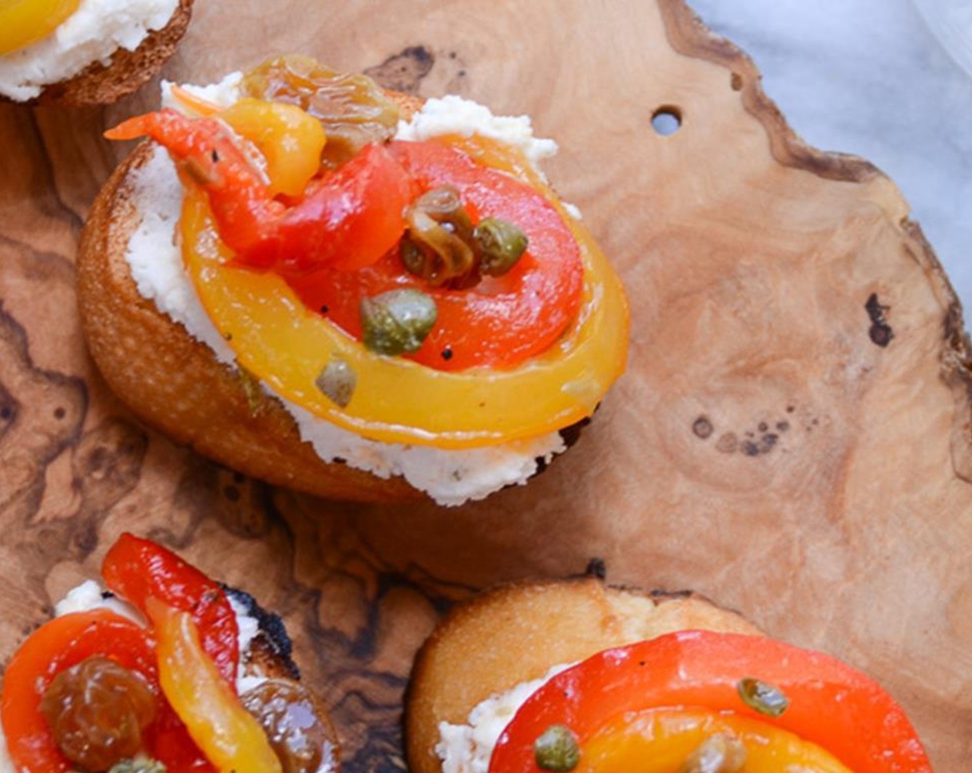 step 12 Top with a spoonful of bell pepper mixture. Drizzle bruschetta with any leftover dressing.