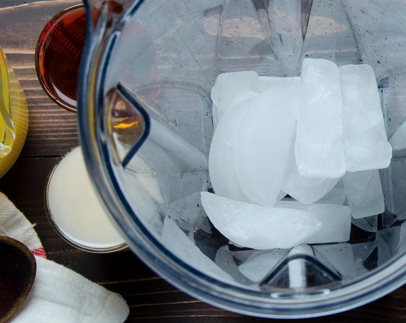 step 1 Place Ice (3 cups) in a blender.