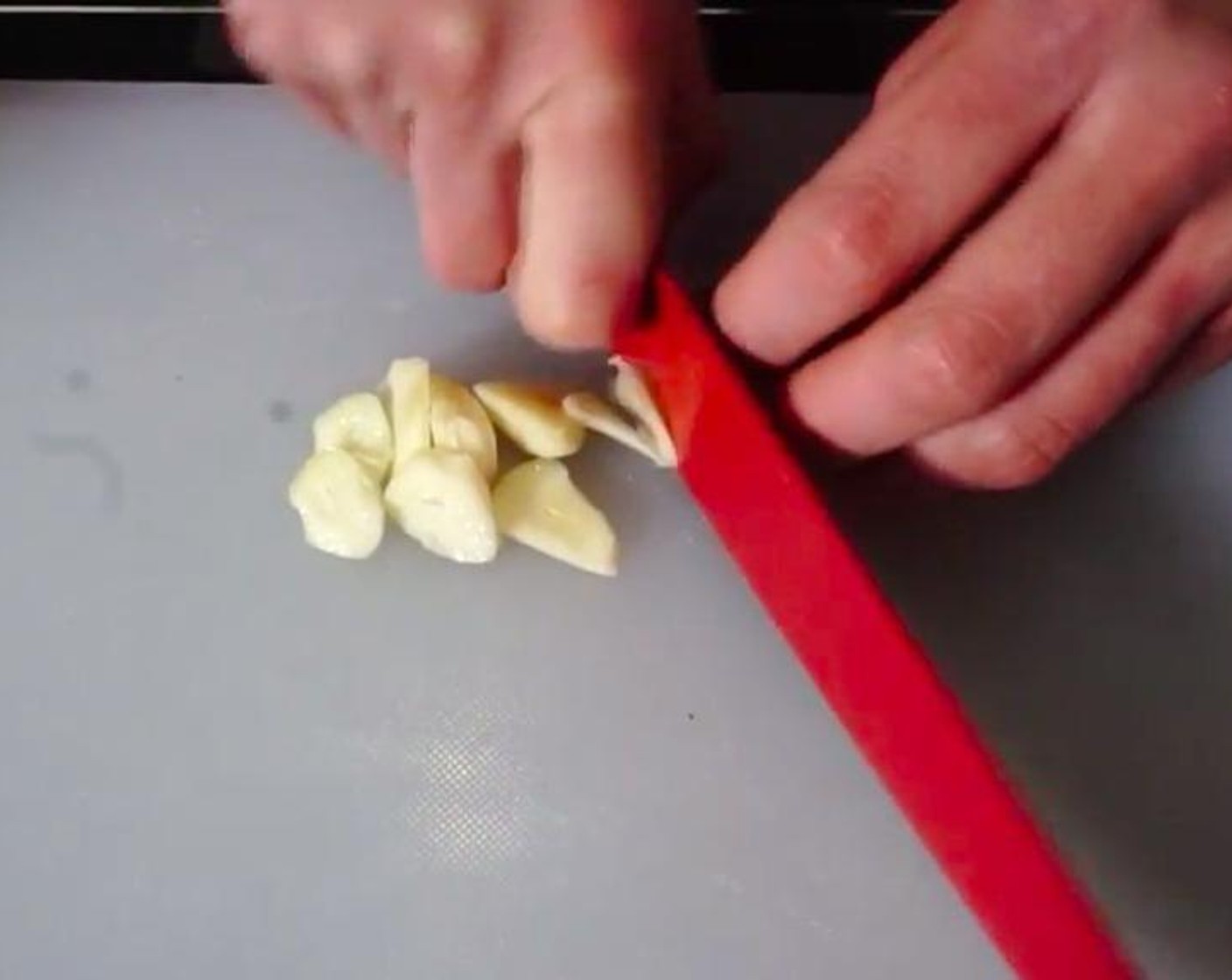 step 2 Peel and slice the Garlic (2 cloves).