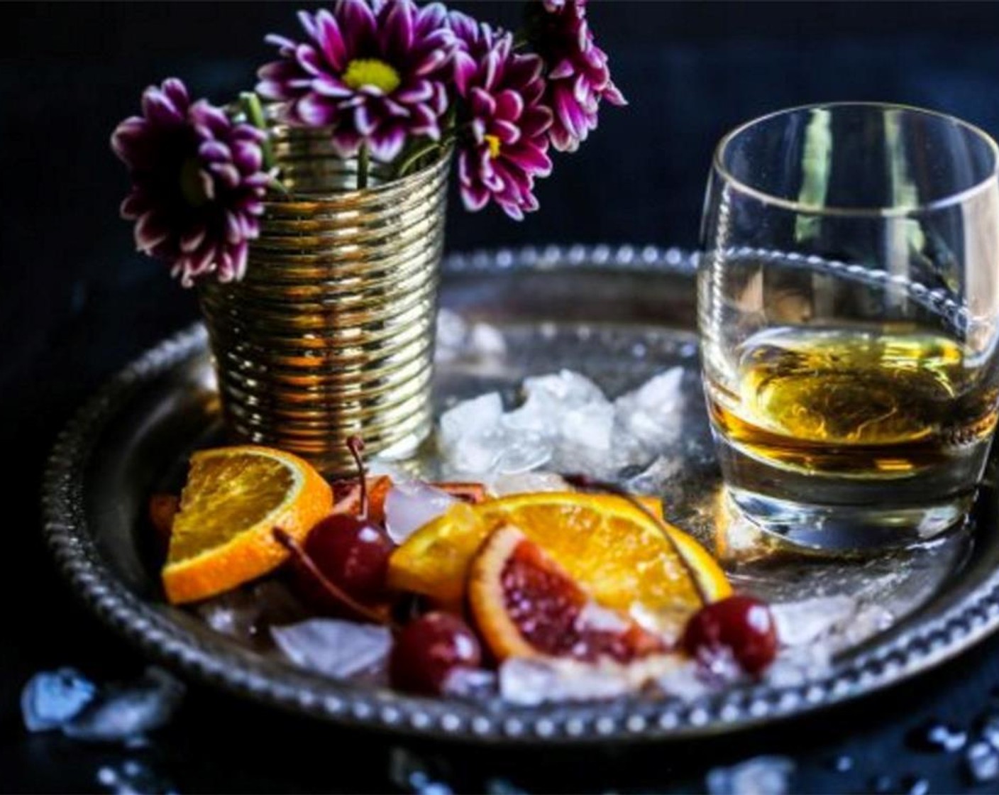 step 2 Pour mixture into a glass and garnish with slices of Oranges (to taste) and Cherries (to taste).