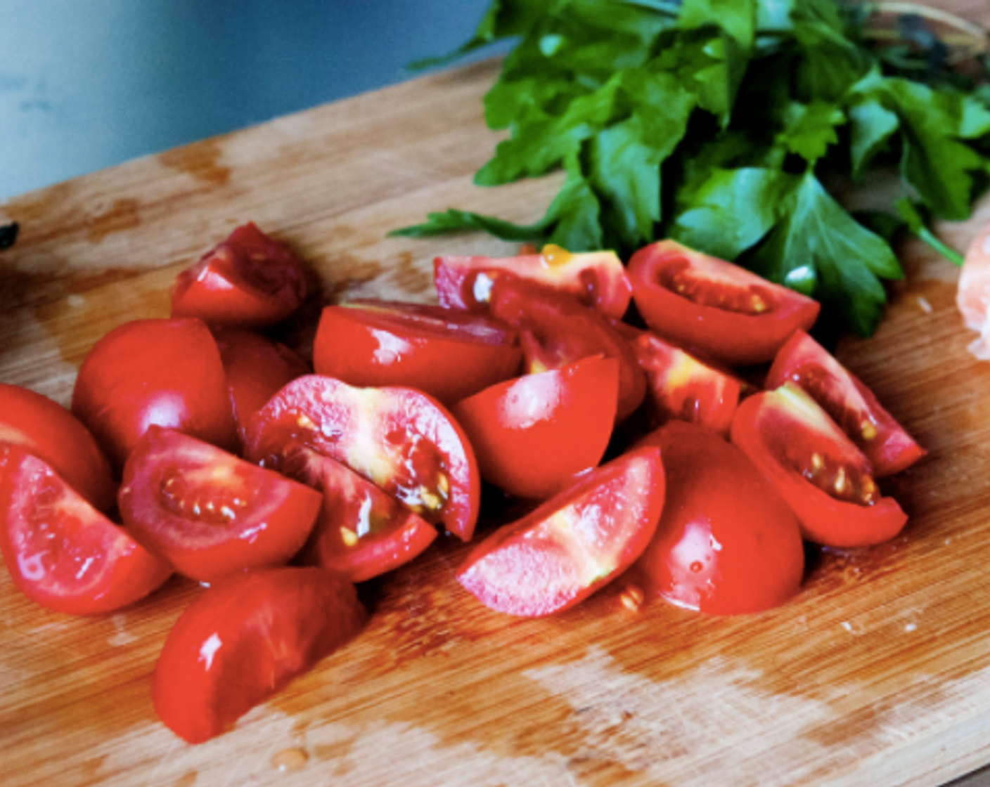 step 2 Wash and cut in half the Grape Tomatoes (8).