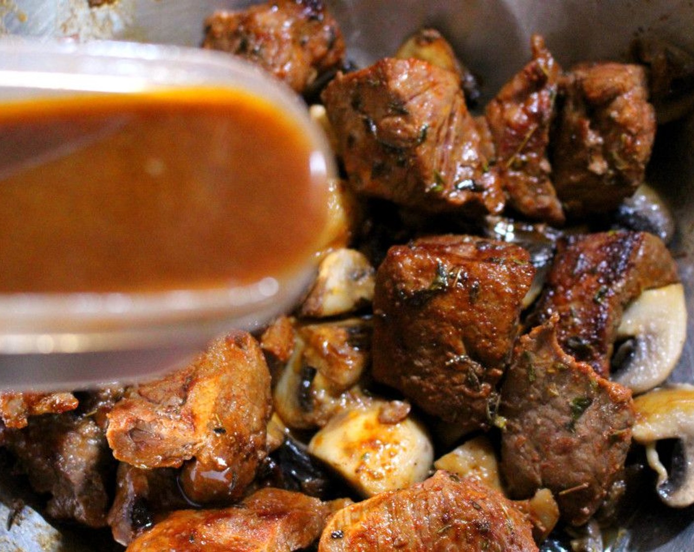 step 3 Add the meat to the mushrooms, and add Demi-Glace (1 cup). Once the meat is coated, set it aside.