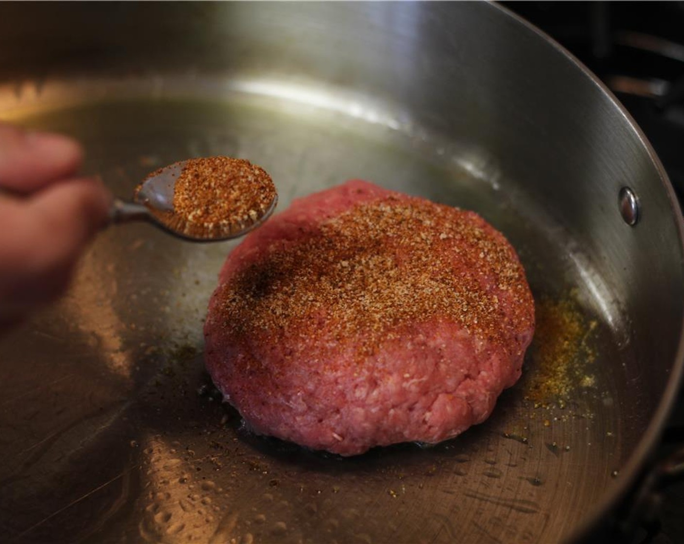 step 10 Cook burgers to Medium- a little pink inside or to your own personal liking. Make sure to season the top side of the burger before flipping.