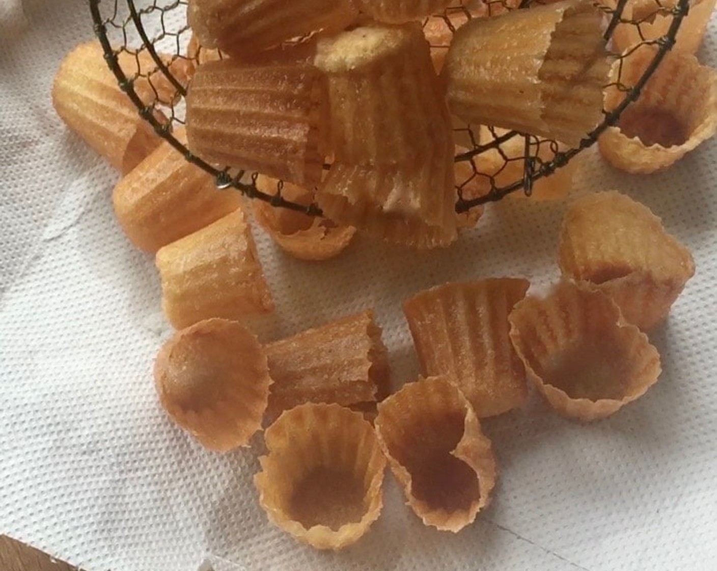 step 15 Drain the fried shells on paper towels. Cool completely before storing in an air-tight container to keep them crispy until needed.