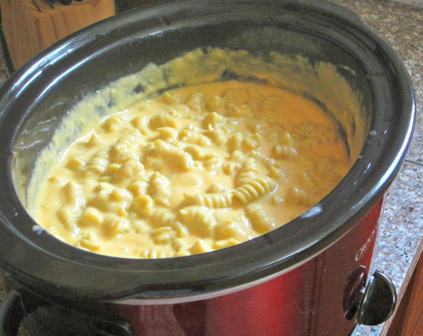 step 3 Cover and cook for two hours on high. Stir occasionally. After two hours, gently stir pasta and add water as needed to loosen. Season with Salt (to taste) and Ground Black Pepper (to taste).