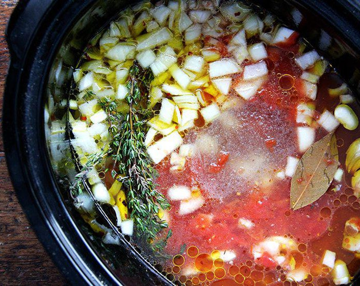 step 3 Add the Water (4 cups) and Extra-Virgin Olive Oil (4 Tbsp). Cook on high for at least six hours or on low for 8 hours or longer.