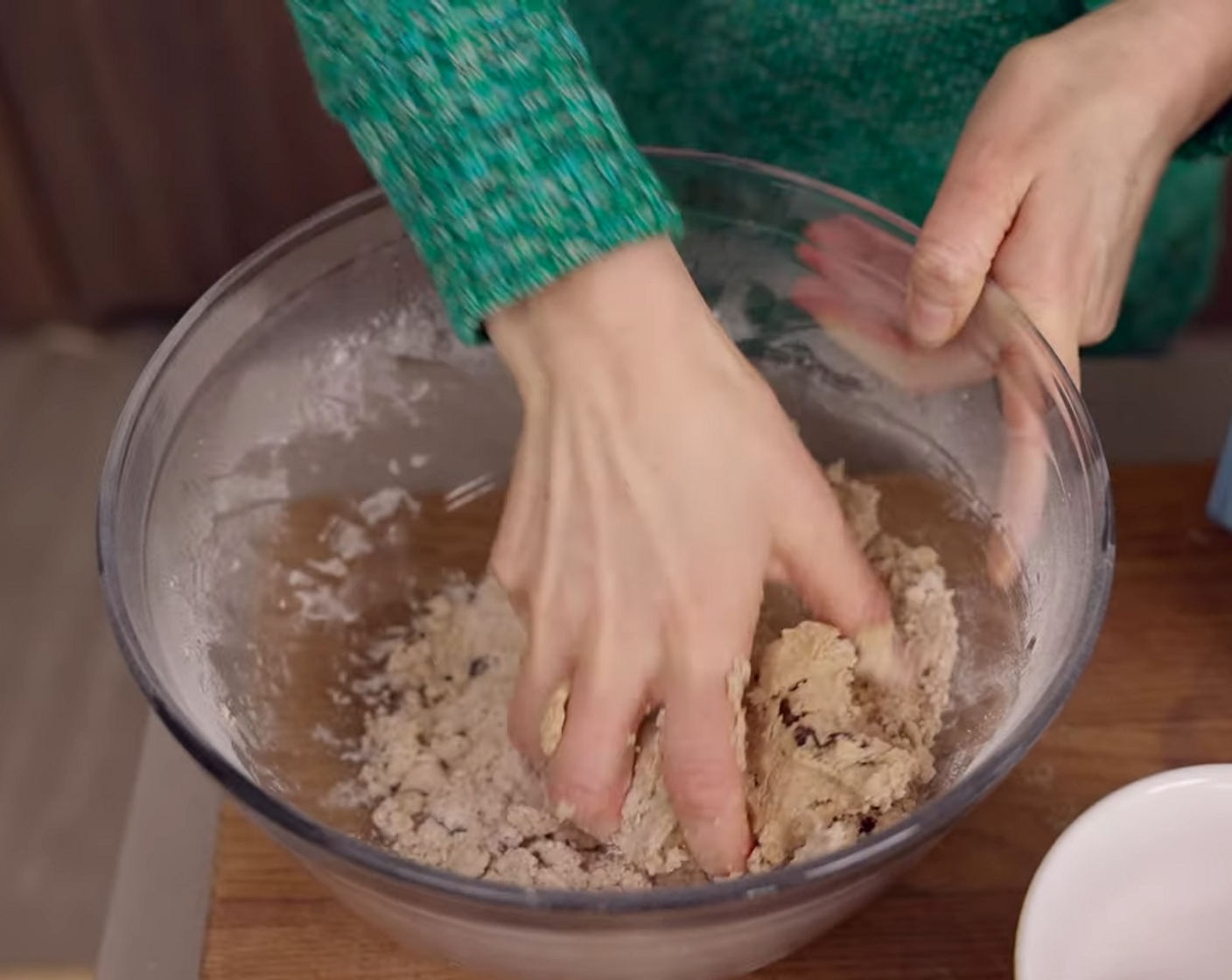 step 5 Using your hands, form the dough together in a ball, and if the dough is too dry (it should not crack) slowly add more water 1 Tbsp at a time.