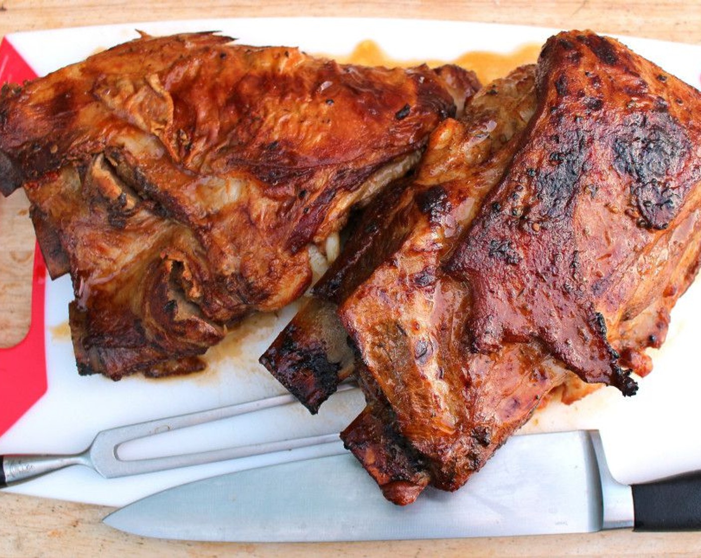 step 7 Transfer the meat to a cutting board, let rest lightly covered for 15 minutes, then pull-out the rib bones.