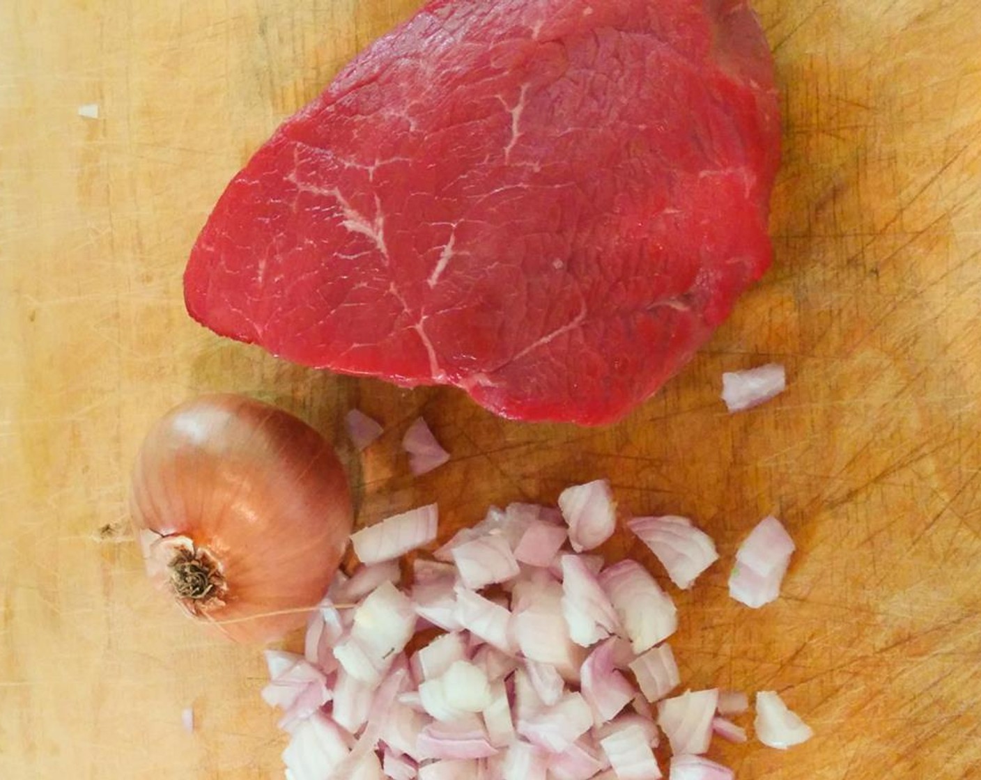 step 3 Peel and dice Shallots (2) into small pieces. Preheat frying pan over medium-high. Combine Olive Oil (1 Tbsp) and the squeeze of a Lemon (1) and drizzle on the steak. Rub the Beef Tenderloin Steaks (2) with Rosemary Sea Salt (1/2 tsp) and freshly ground pepper.