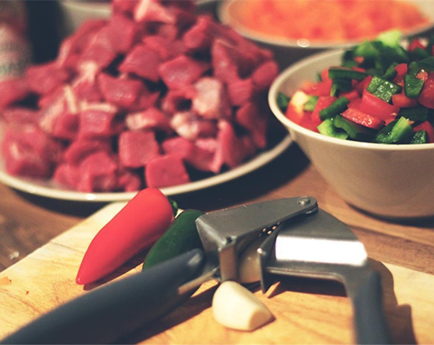 step 1 Cut the Green Bell Peppers (3), Carrots (2), Chili Peppers (2), and Garlic (2 cloves) into small chunks. Cube the Beef (1.7 lb). Wash the Red Kidney Beans (2 1/3 cups) and Cranberry Beans (2 cups) thoroughly and set them aside.