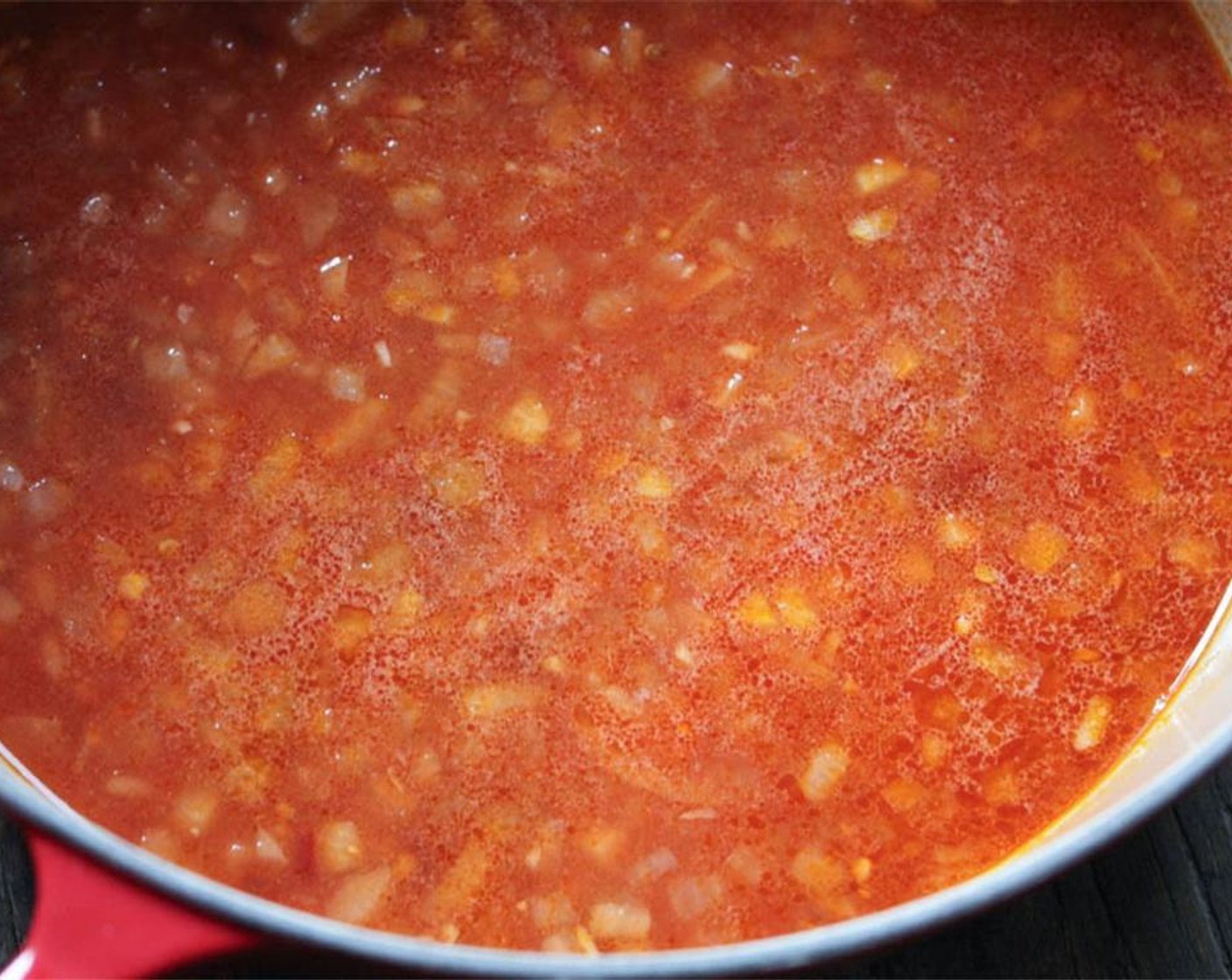 step 5 Add the chopped chipotle pepper, adobo sauce, lime juice, Honey (1 1/2 Tbsp), Canned Tomato Purée (3/4 cup) and Low-Sodium Chicken Stock (3/4 cup), and bring the mixture to a boil.