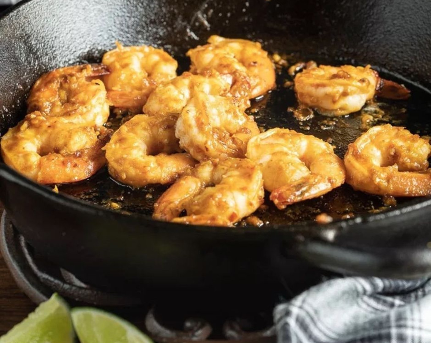 step 4 Heat a large skillet over medium-high heat and add Canola Oil (1/2 Tbsp). Once hot, add shrimp and cook in a single layer. Cook for about 2-2 1/2 minutes per side, until the paste starts to caramelize and stick to the shrimp.