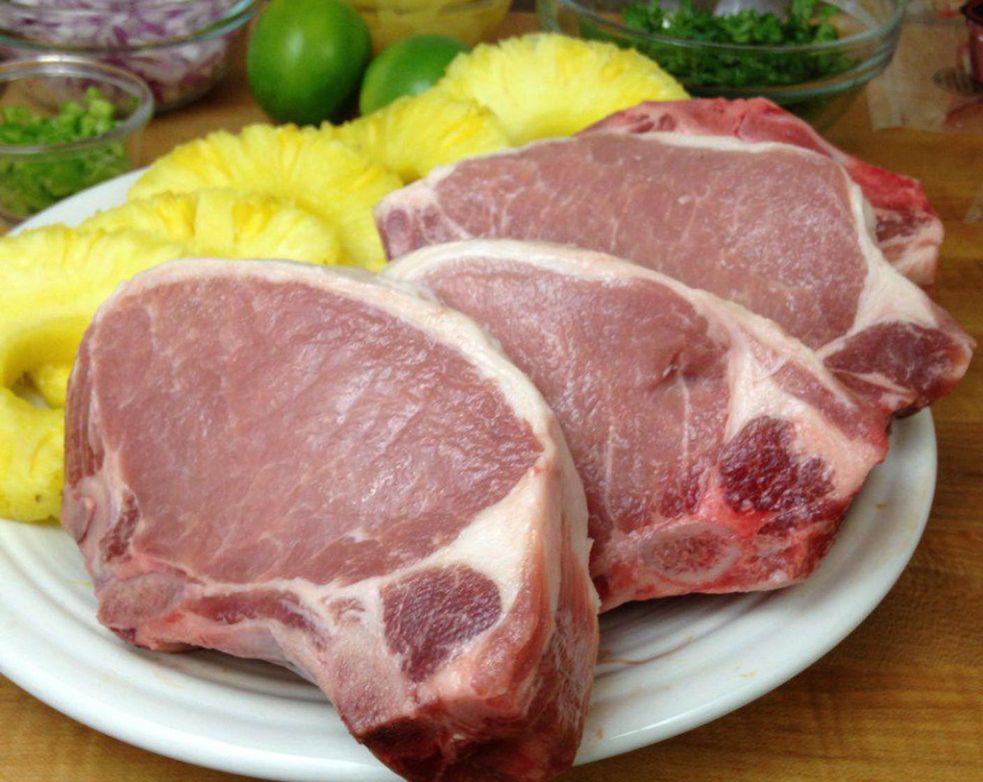 step 1 First the Pork Chops (4) go into a quick 30 minute Hawaiian Marinade (12 fl oz) to get the sweet and sour flavor going on the outside. Place the chops in a large ziplock bag, pour the marinade over the top, and work the chops around to cover. Store the chops in the refrigerator for 30 minutes.